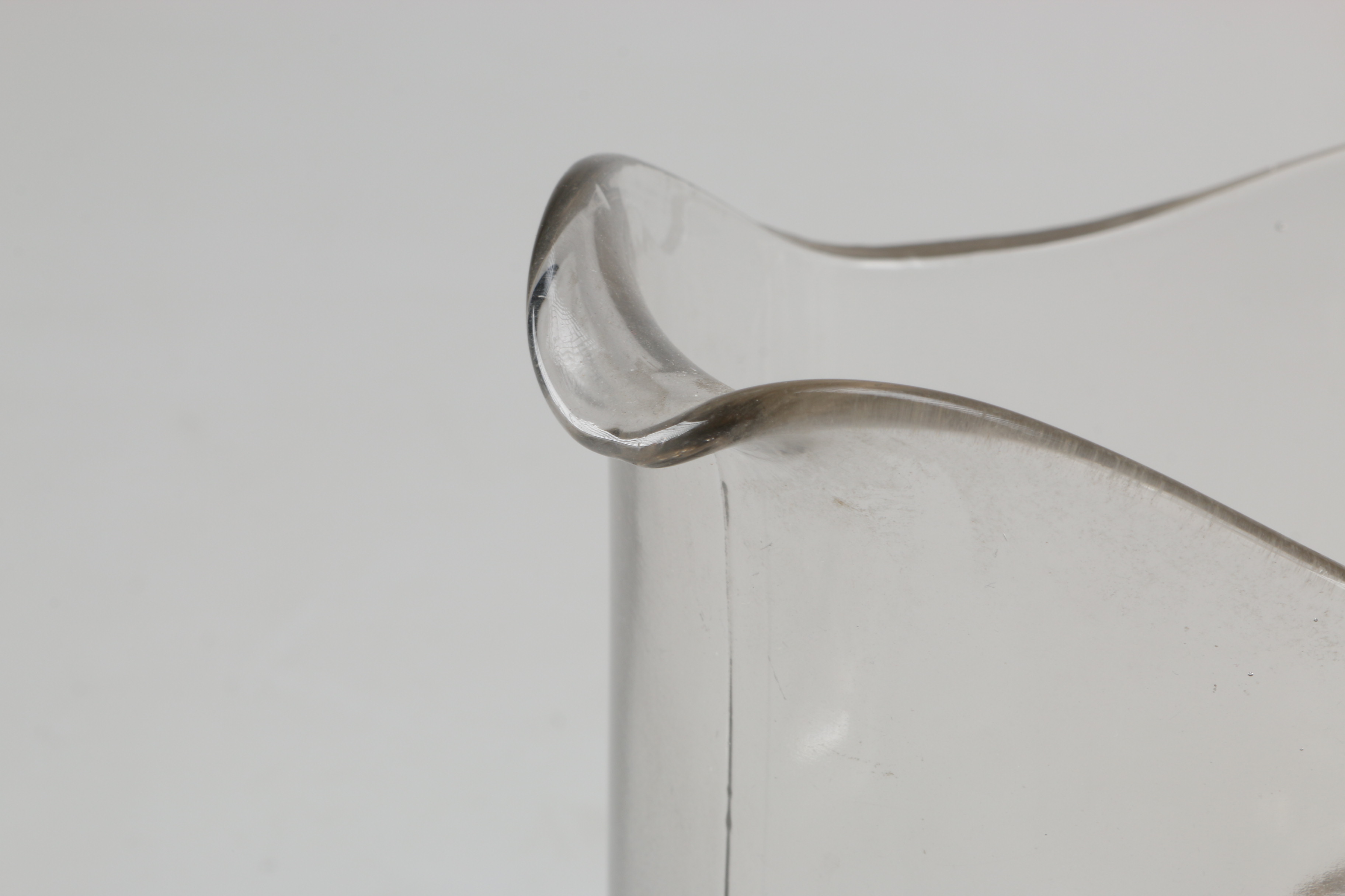 Assortment of Glass Items and Ceramic Pitcher