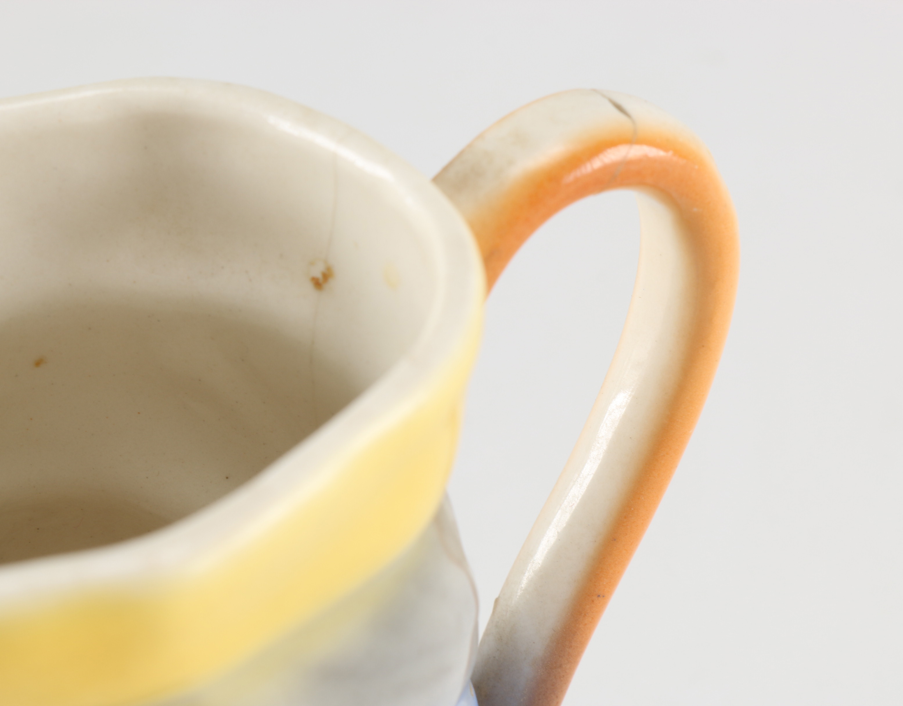 Assortment of Glass Items and Ceramic Pitcher