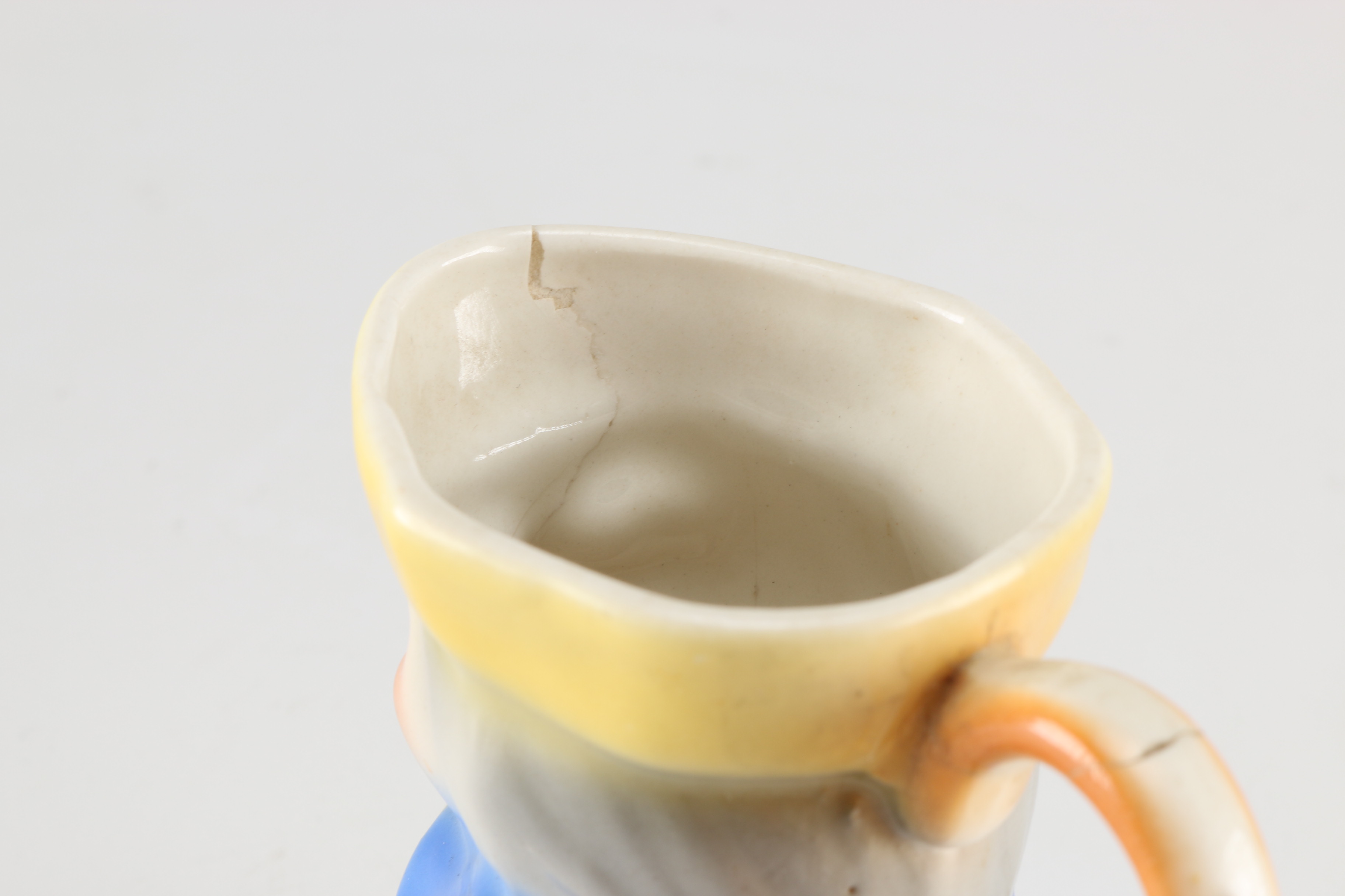 Assortment of Glass Items and Ceramic Pitcher