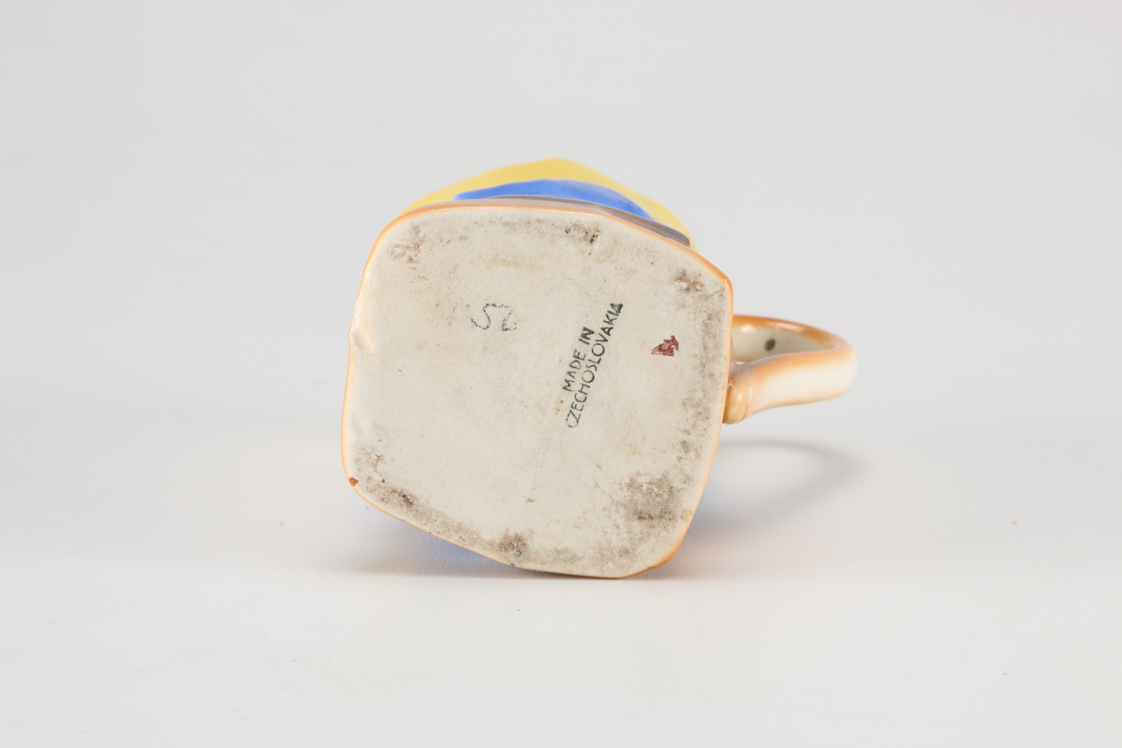 Assortment of Glass Items and Ceramic Pitcher