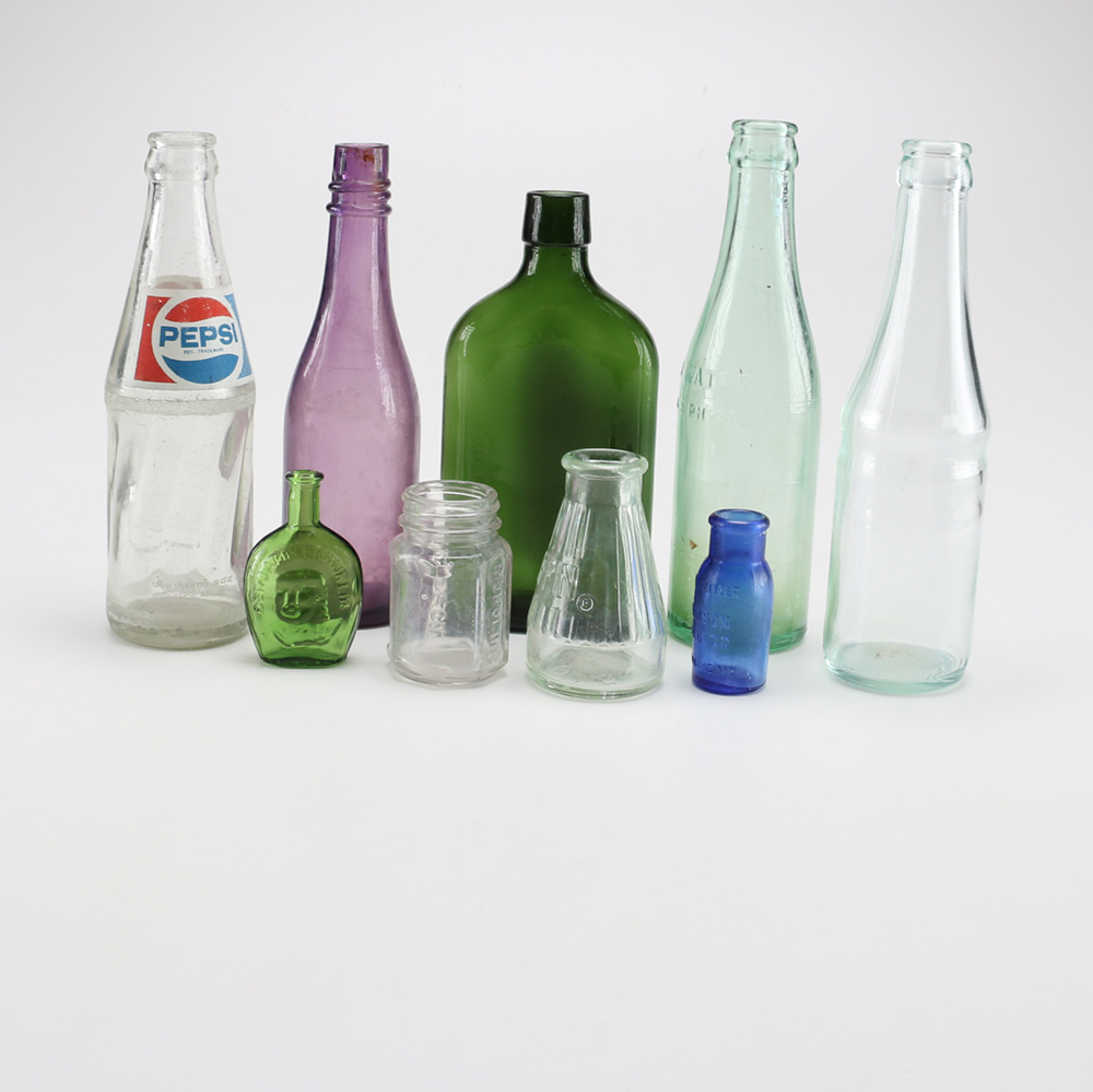 Assortment of Vintage Glass Bottles