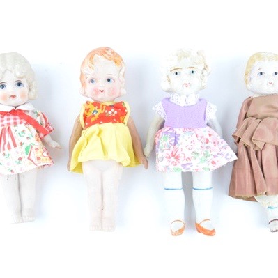 Four Vintage Japanese Bisque Porcelain Dolls with Dresses