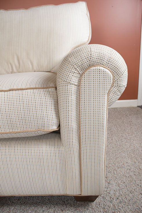 Contemporary Three-Piece Sectional Sofa and Ottoman by J. Raymond Furniture