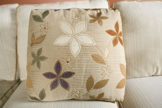 Contemporary Three-Piece Sectional Sofa and Ottoman by J. Raymond Furniture