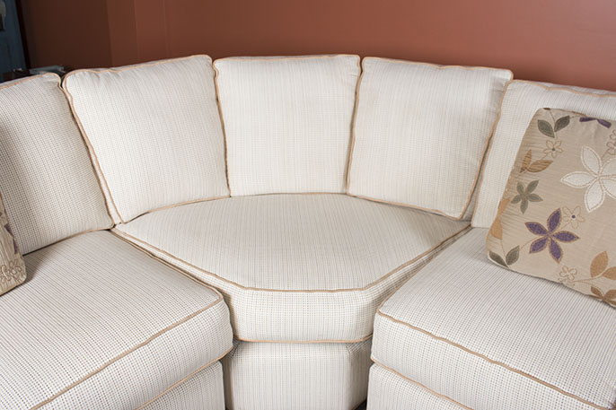 Contemporary Three-Piece Sectional Sofa and Ottoman by J. Raymond Furniture