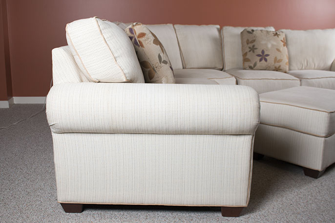 Contemporary Three-Piece Sectional Sofa and Ottoman by J. Raymond Furniture