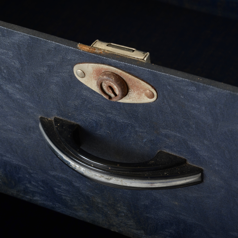 Black Steamer Trunk with Hangers and Four Drawers