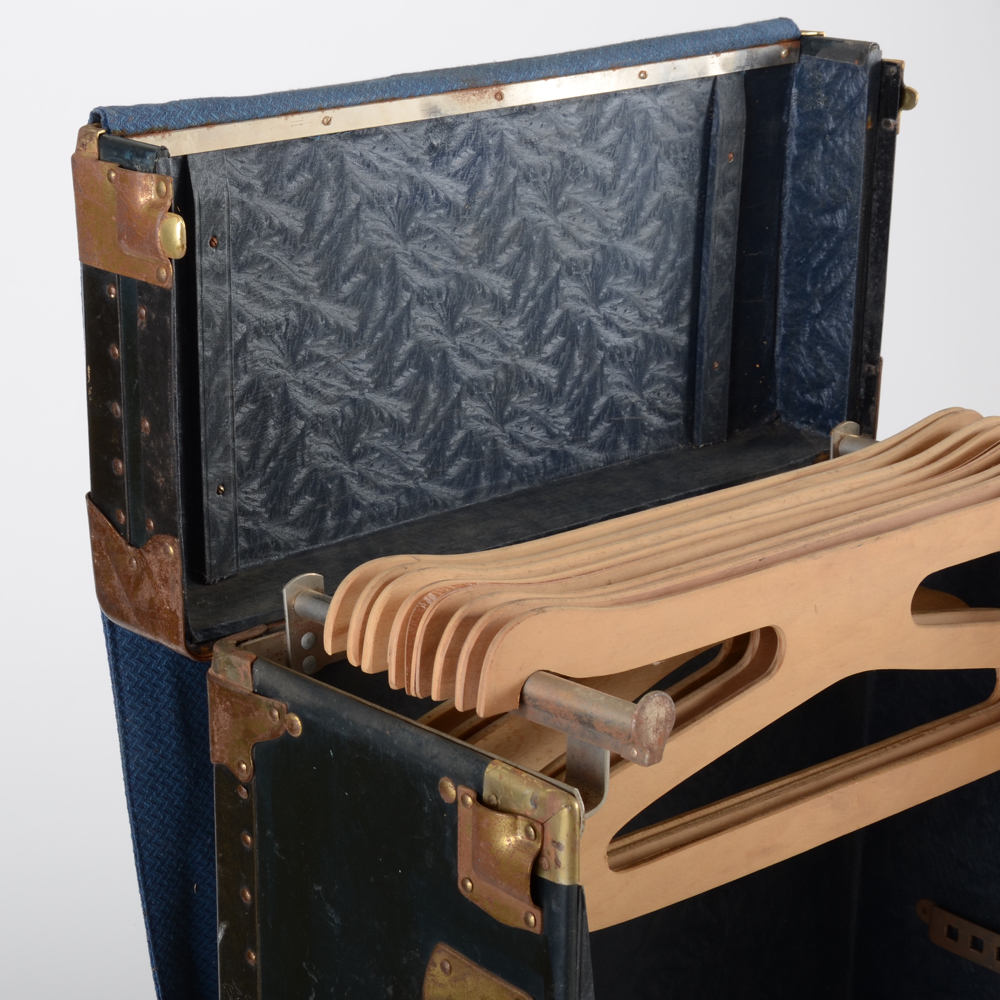 Black Steamer Trunk with Hangers and Four Drawers