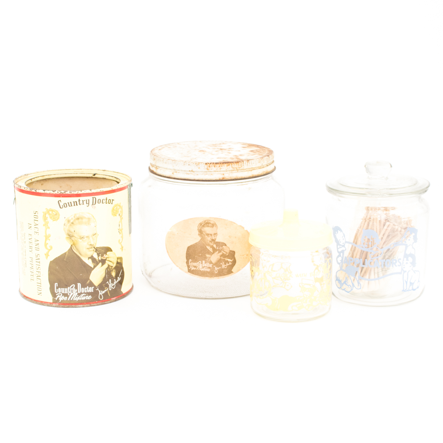 Four Vintage Glass Jars and Tins Featuring the Dionne Quintuplets and the Film "The Country Doctor"