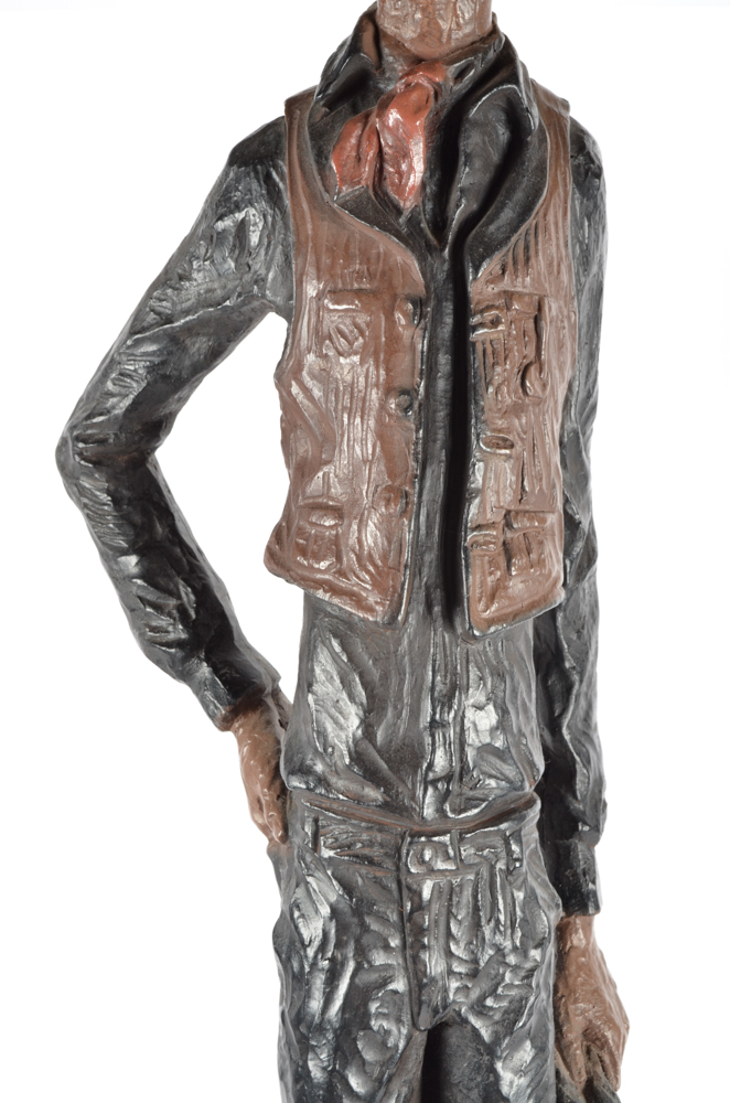 Cast Metal Cowboy Sculpture