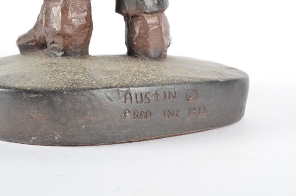 Cast Metal Cowboy Sculpture