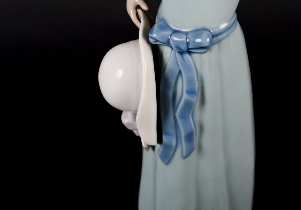 Lladro "Prissy Girl with Straw Hat" Figurine