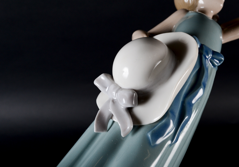 Lladro "Prissy Girl with Straw Hat" Figurine