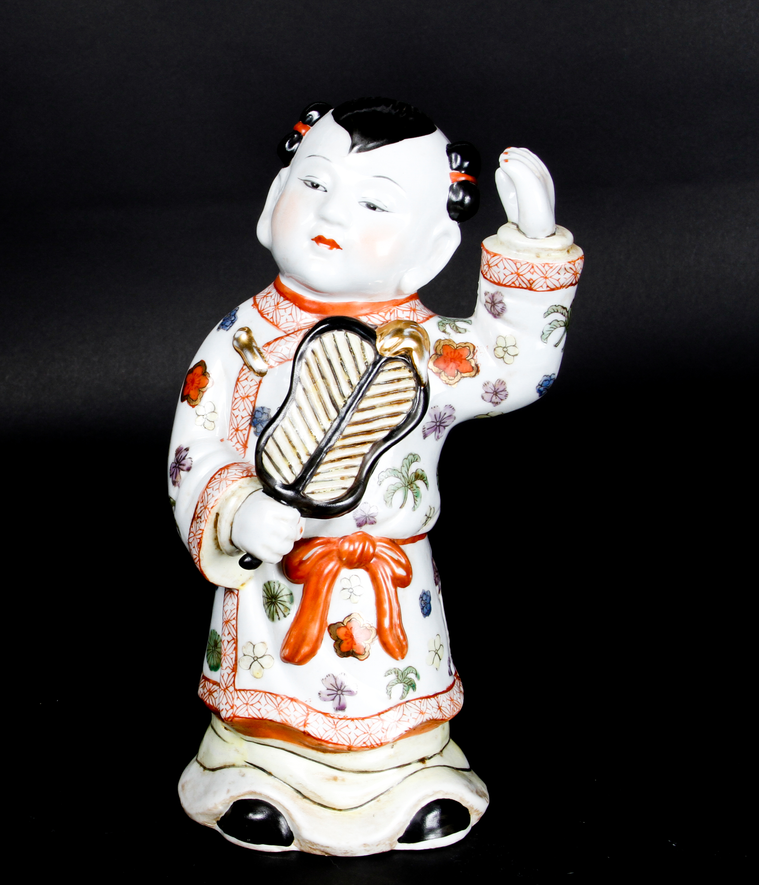 Pair of Chinese Boy and Girl Porcelain Figurines
