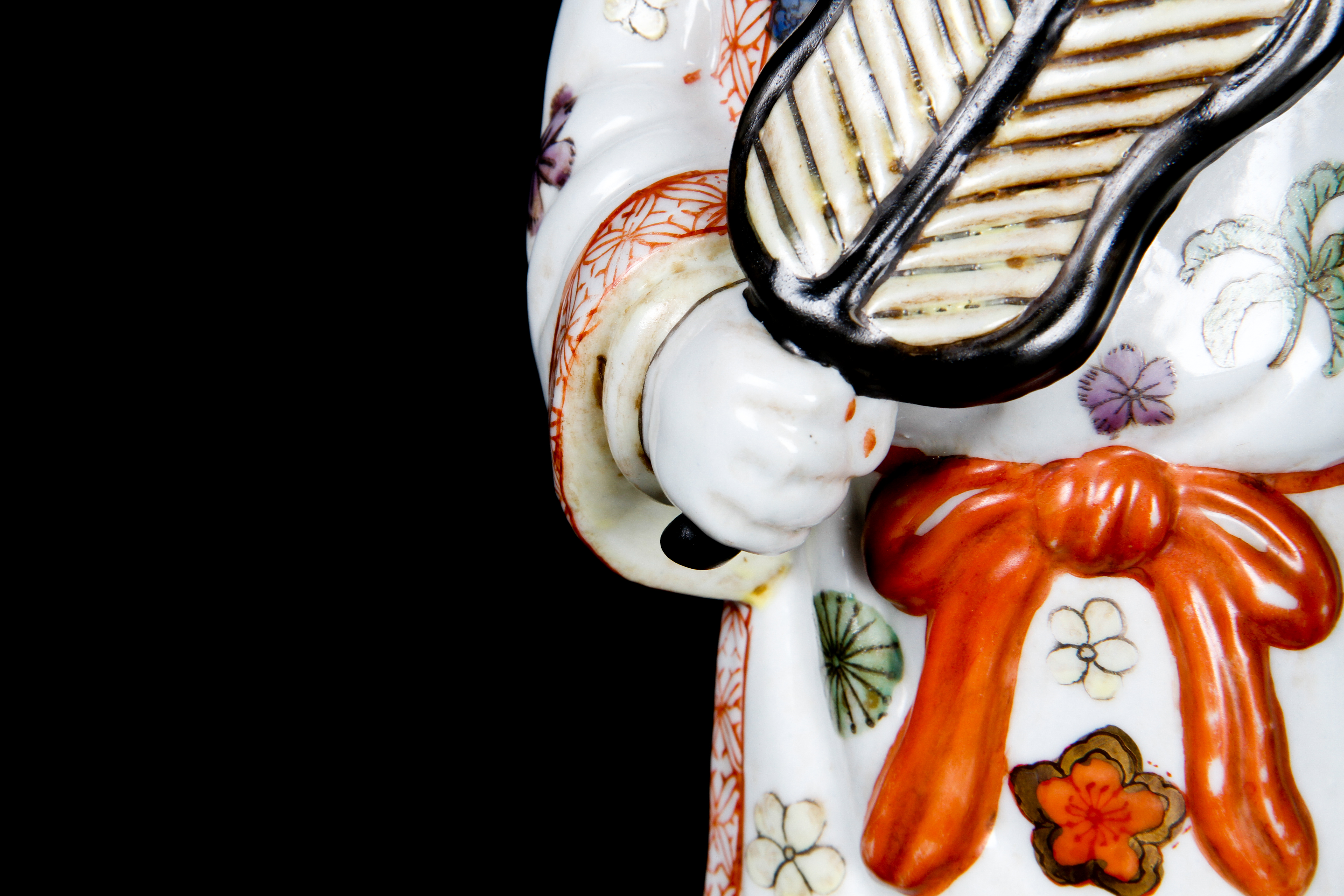 Pair of Chinese Boy and Girl Porcelain Figurines