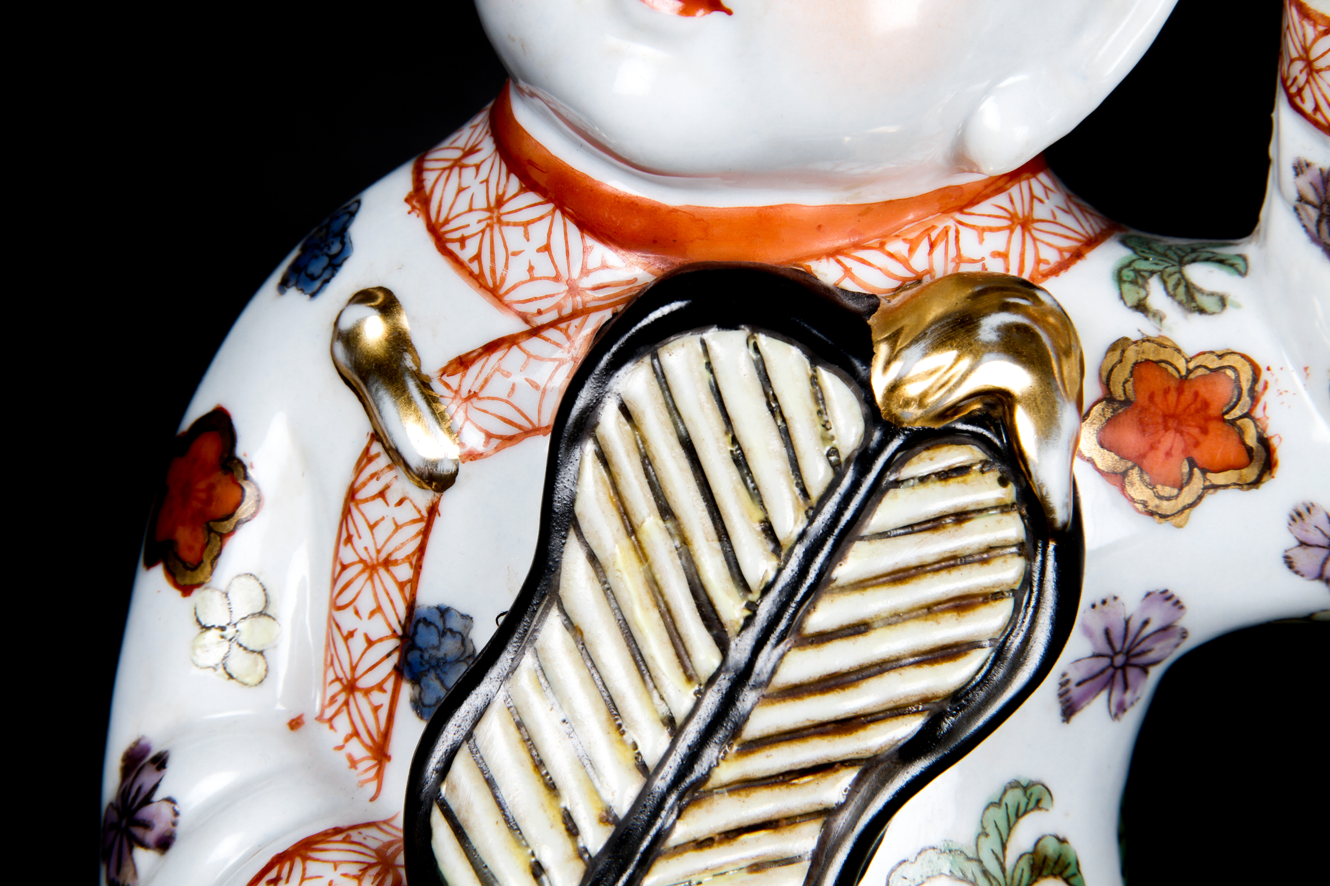 Pair of Chinese Boy and Girl Porcelain Figurines