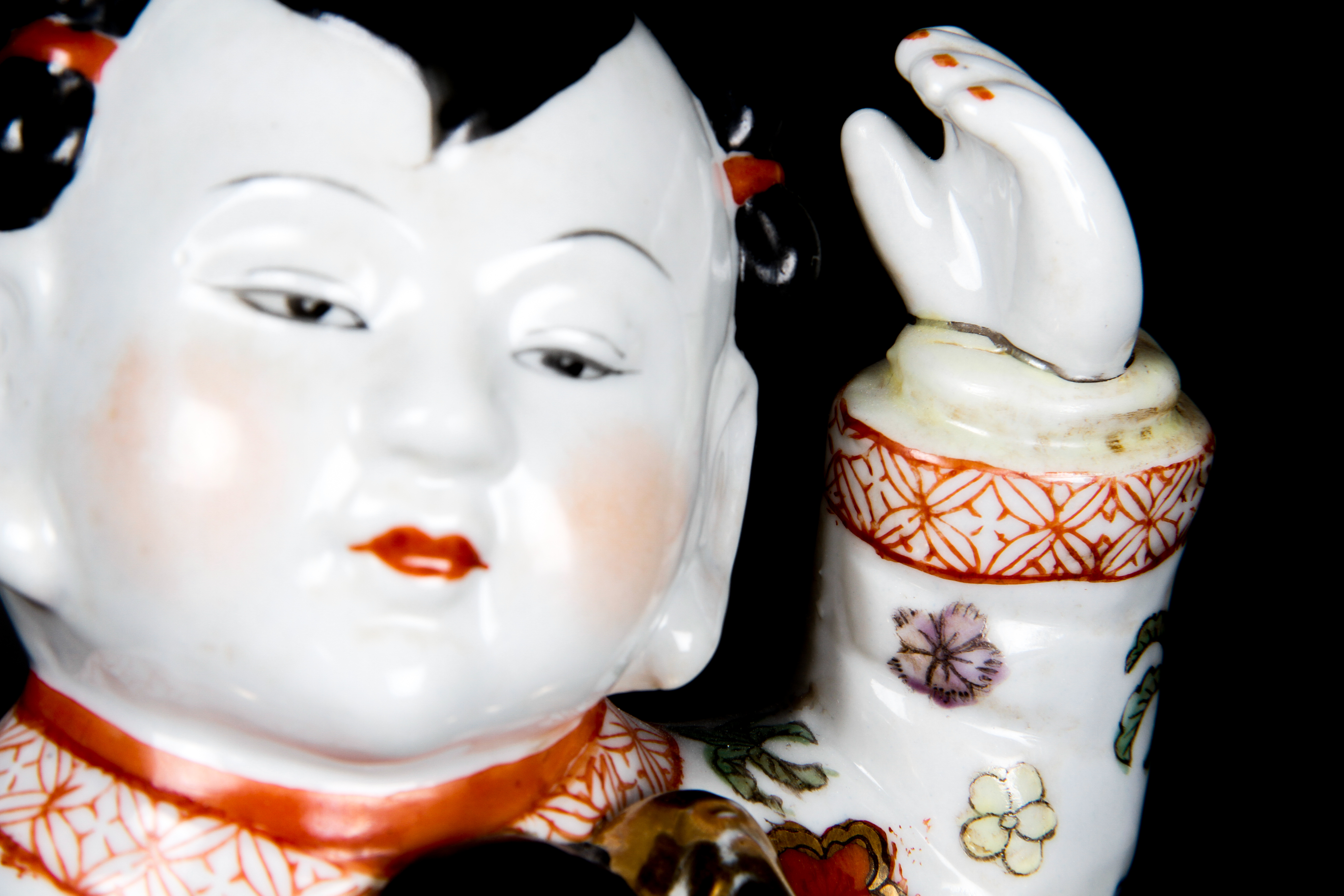 Pair of Chinese Boy and Girl Porcelain Figurines