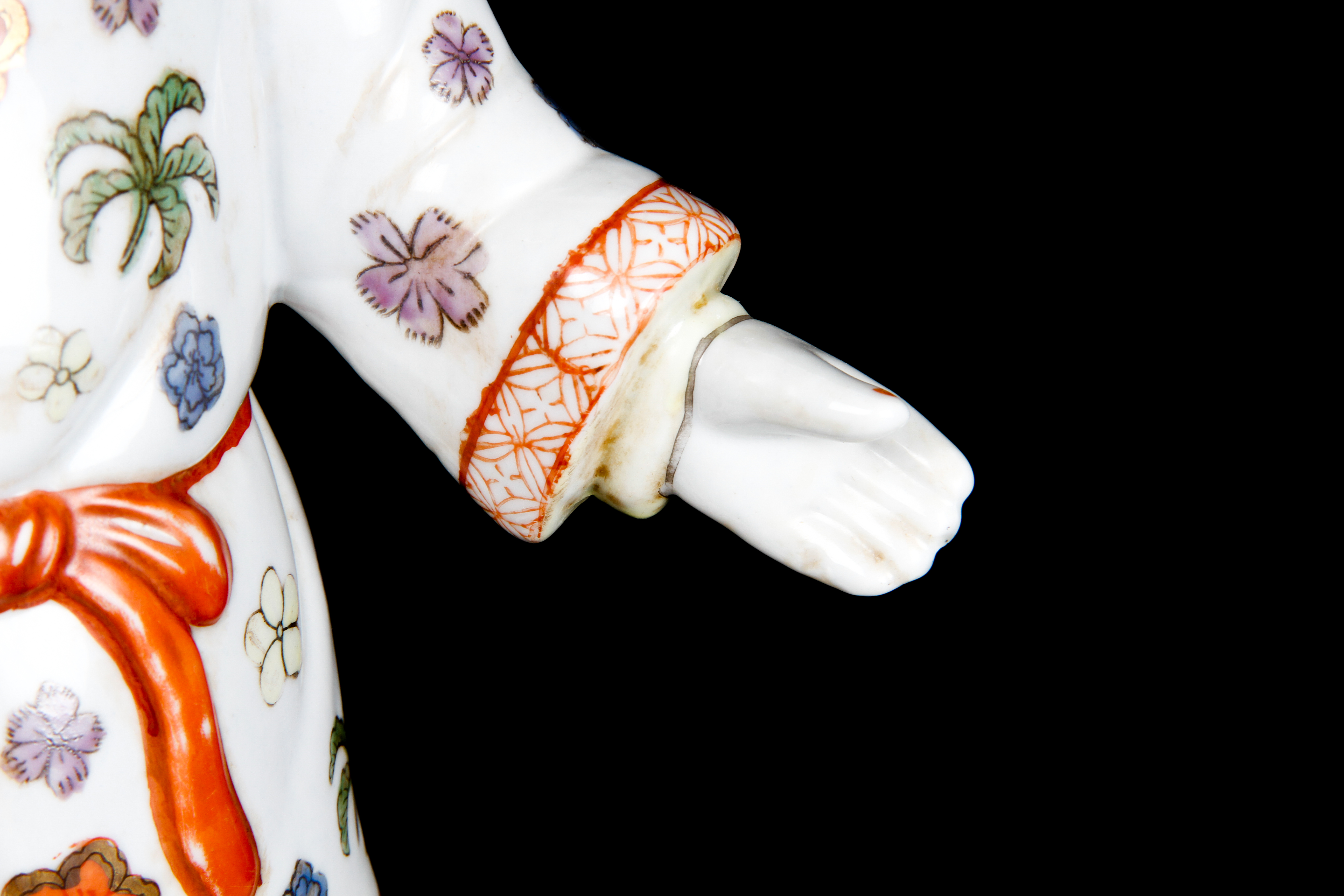 Pair of Chinese Boy and Girl Porcelain Figurines