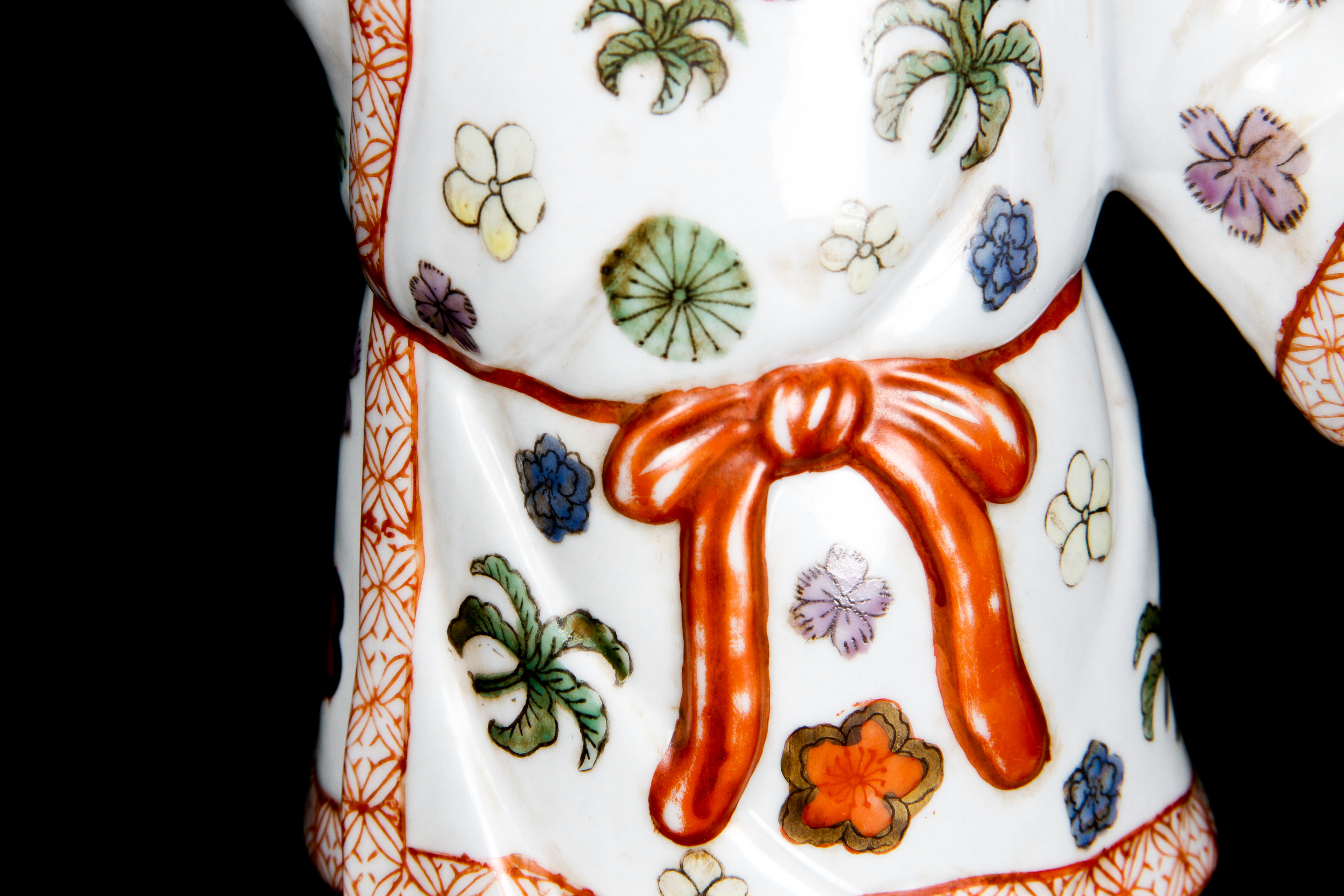 Pair of Chinese Boy and Girl Porcelain Figurines