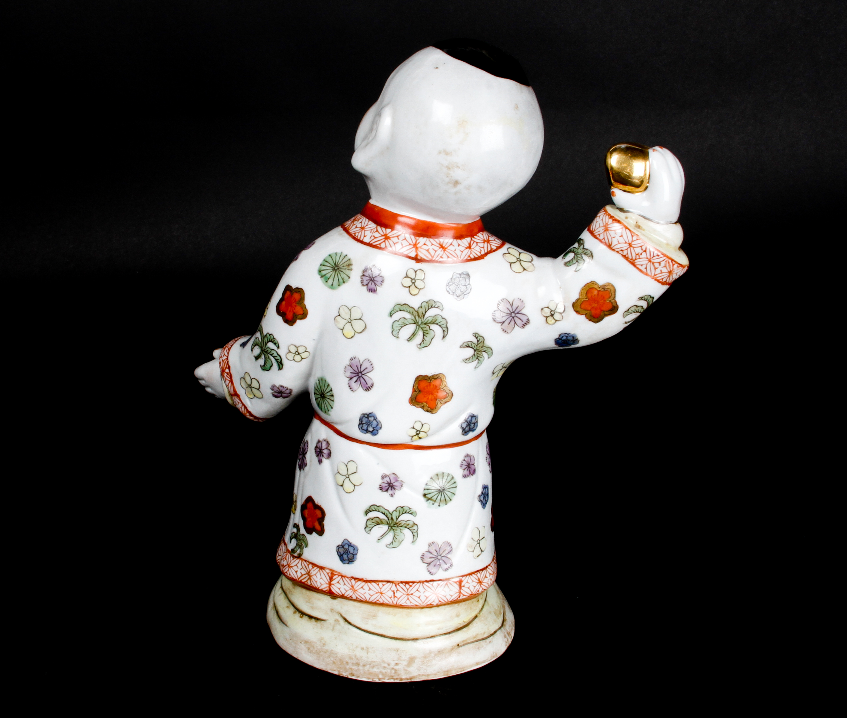 Pair of Chinese Boy and Girl Porcelain Figurines