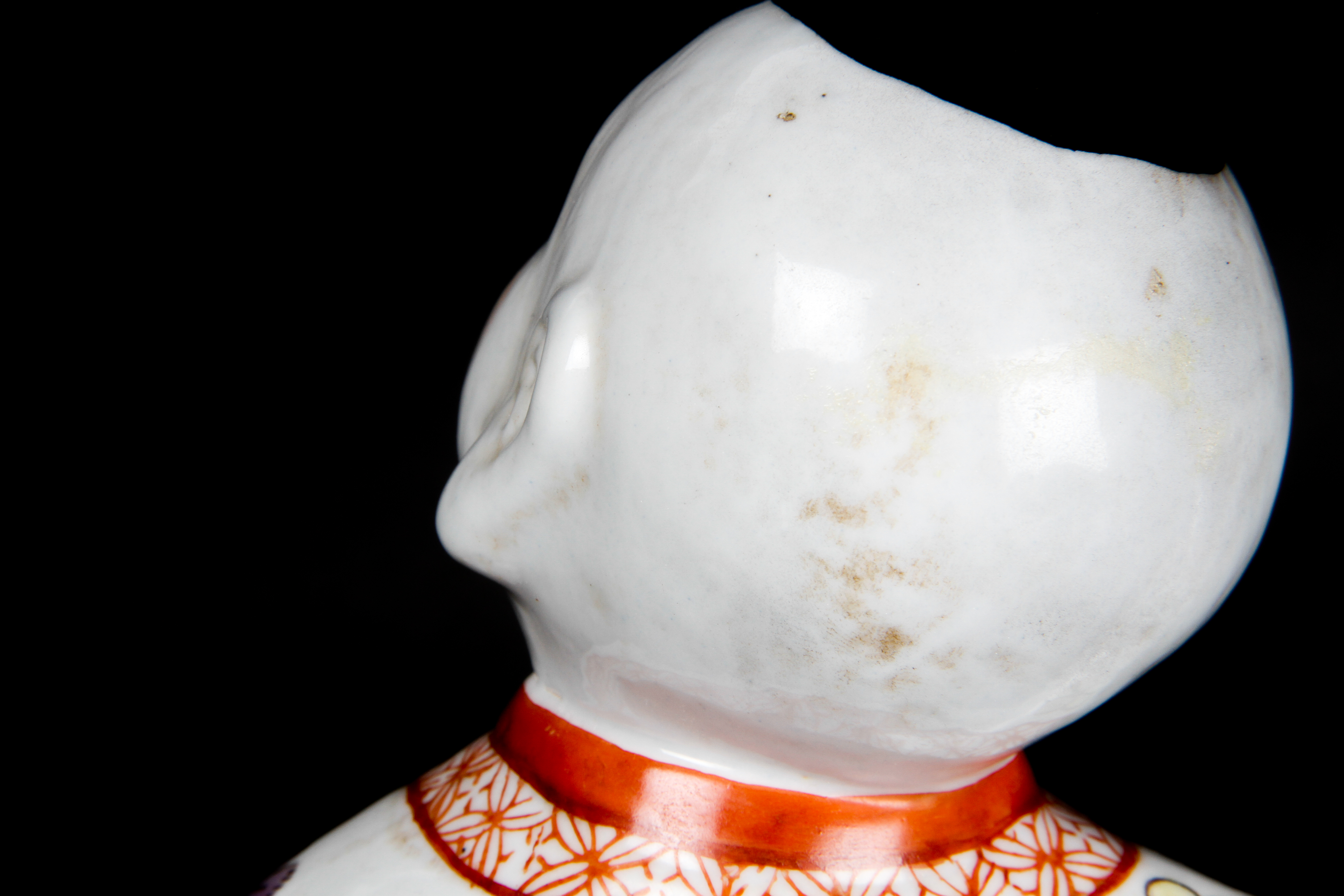 Pair of Chinese Boy and Girl Porcelain Figurines