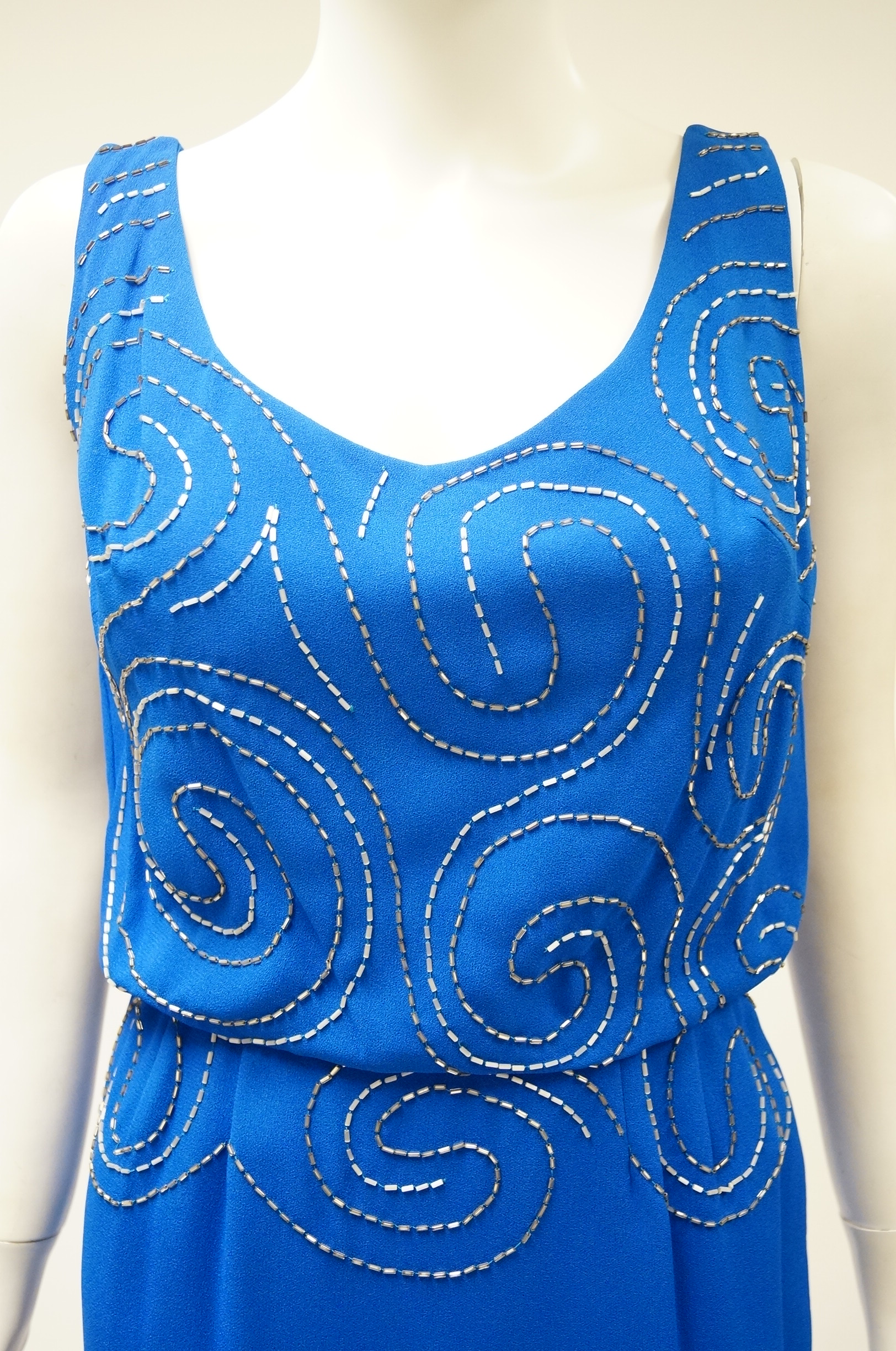 Vintage Sleeveless Gown with Silver Beaded Design