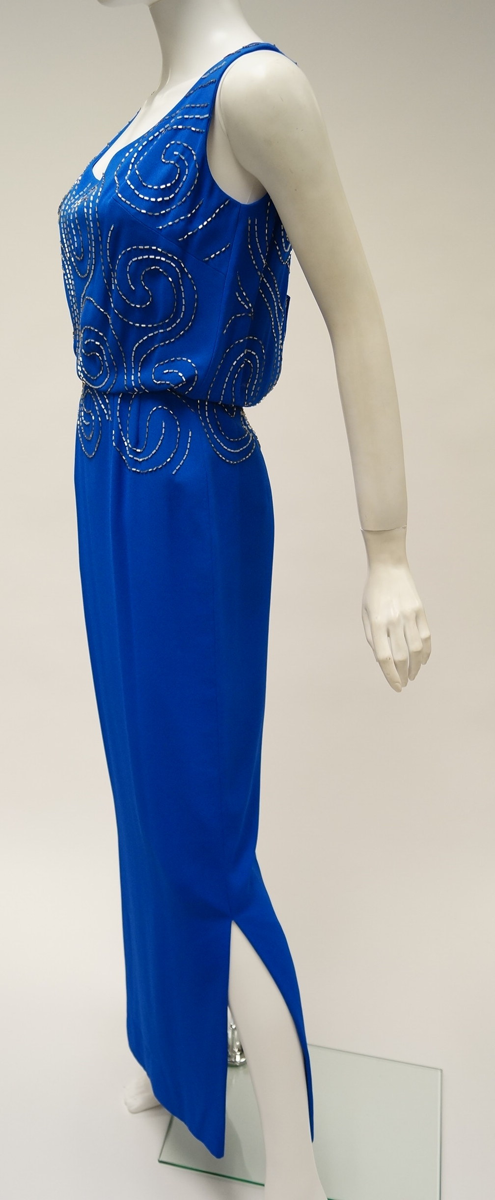 Vintage Sleeveless Gown with Silver Beaded Design