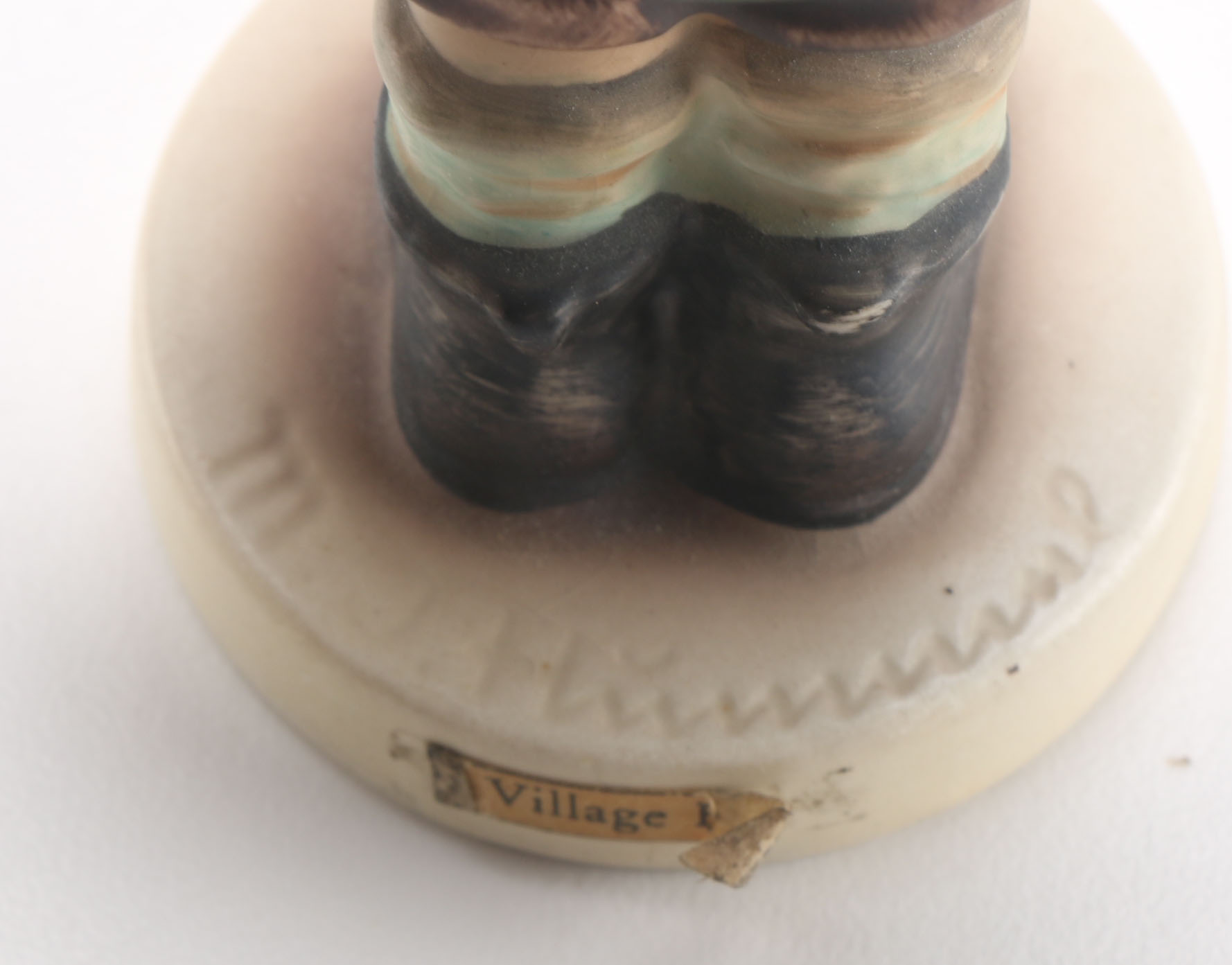 Goebel Hummels "Little Tooter", "Village Boy", "Globe Trotter", and "Lost Sheep"