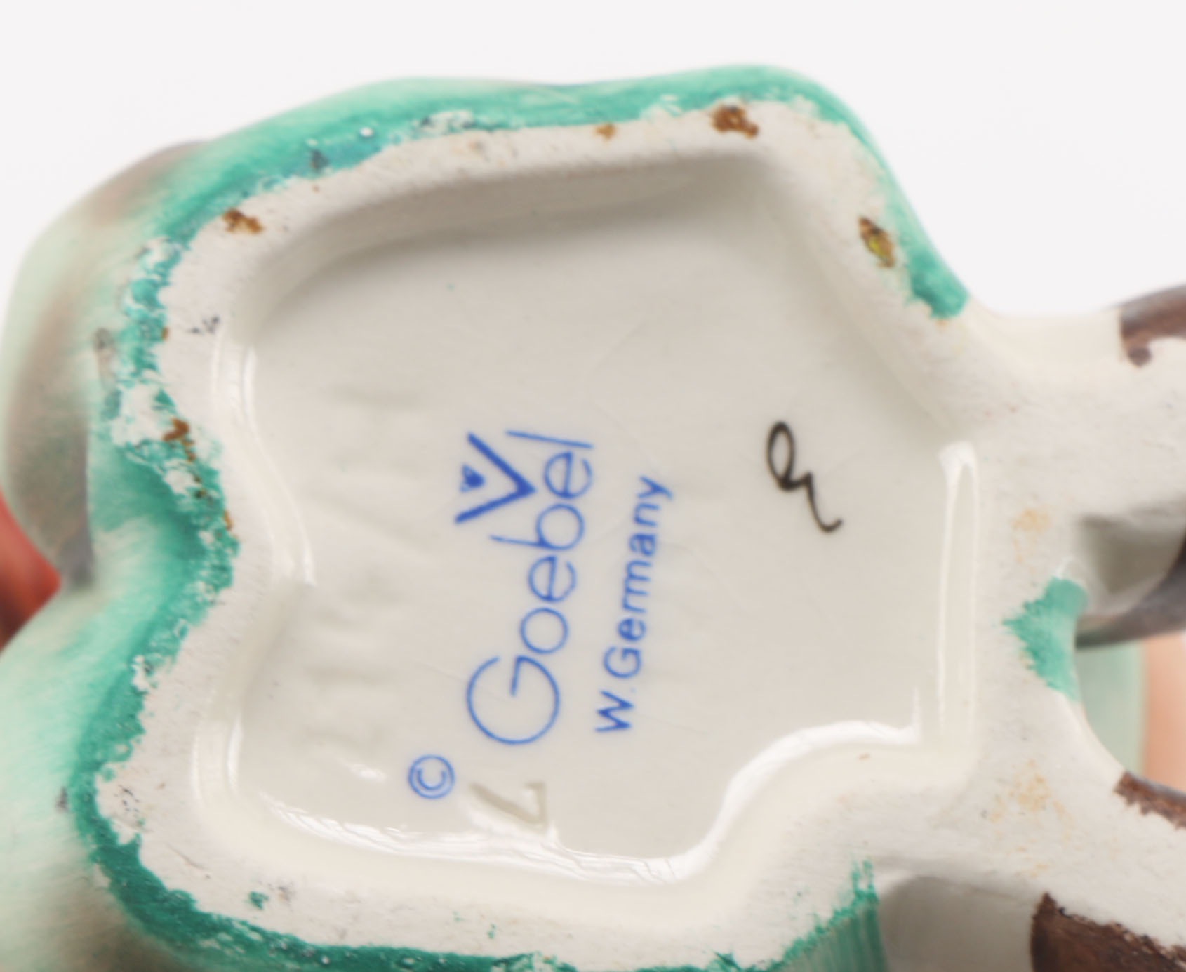 Goebel Hummels "Little Tooter", "Village Boy", "Globe Trotter", and "Lost Sheep"