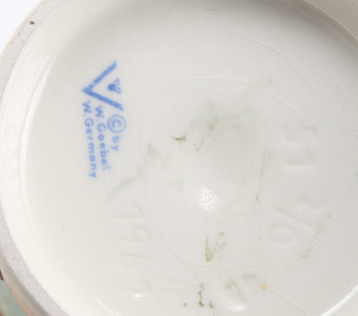 Goebel Hummels "Little Tooter", "Village Boy", "Globe Trotter", and "Lost Sheep"