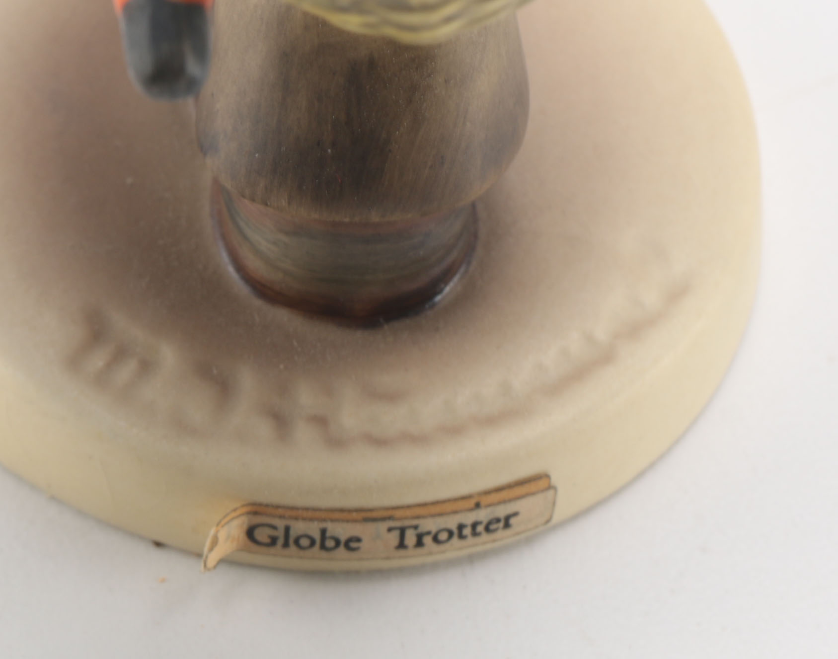 Goebel Hummels "Little Tooter", "Village Boy", "Globe Trotter", and "Lost Sheep"