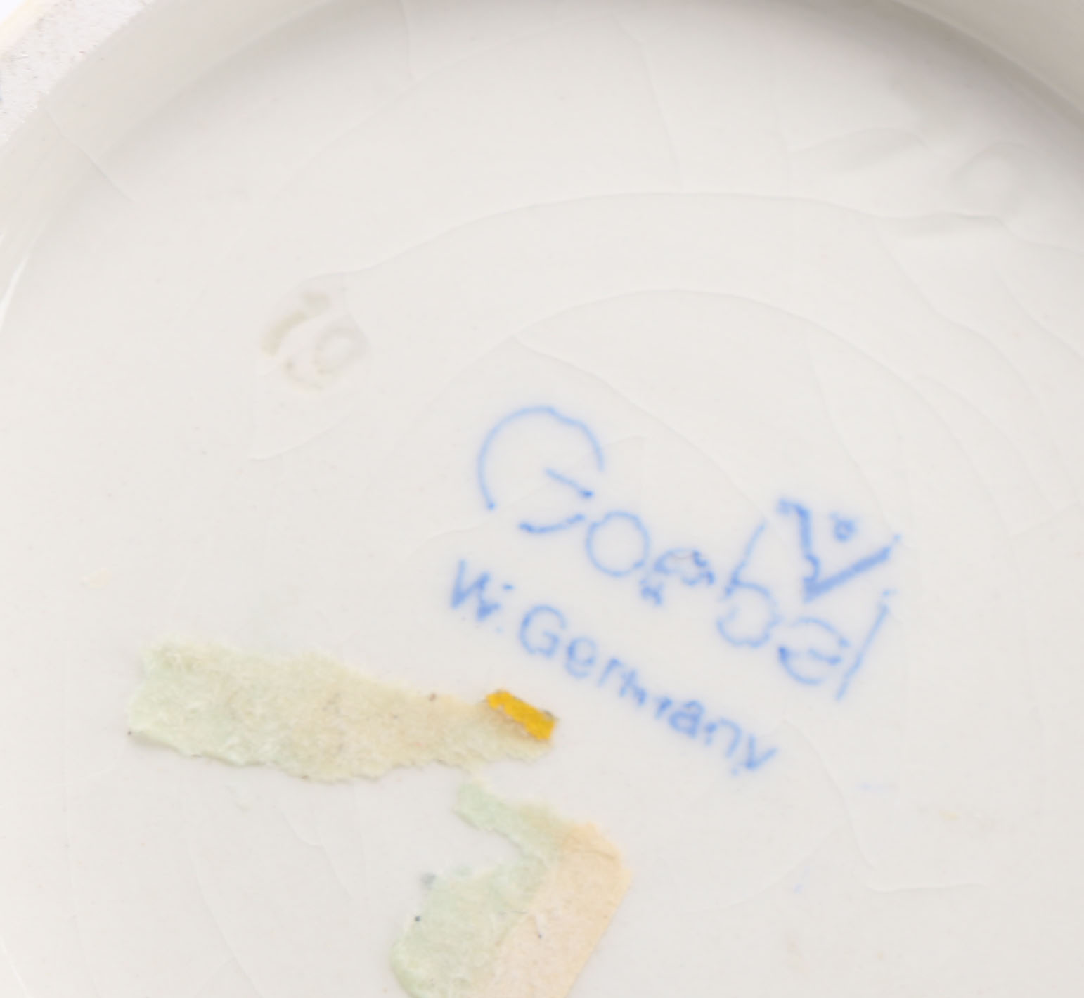 Goebel Hummels "Little Tooter", "Village Boy", "Globe Trotter", and "Lost Sheep"