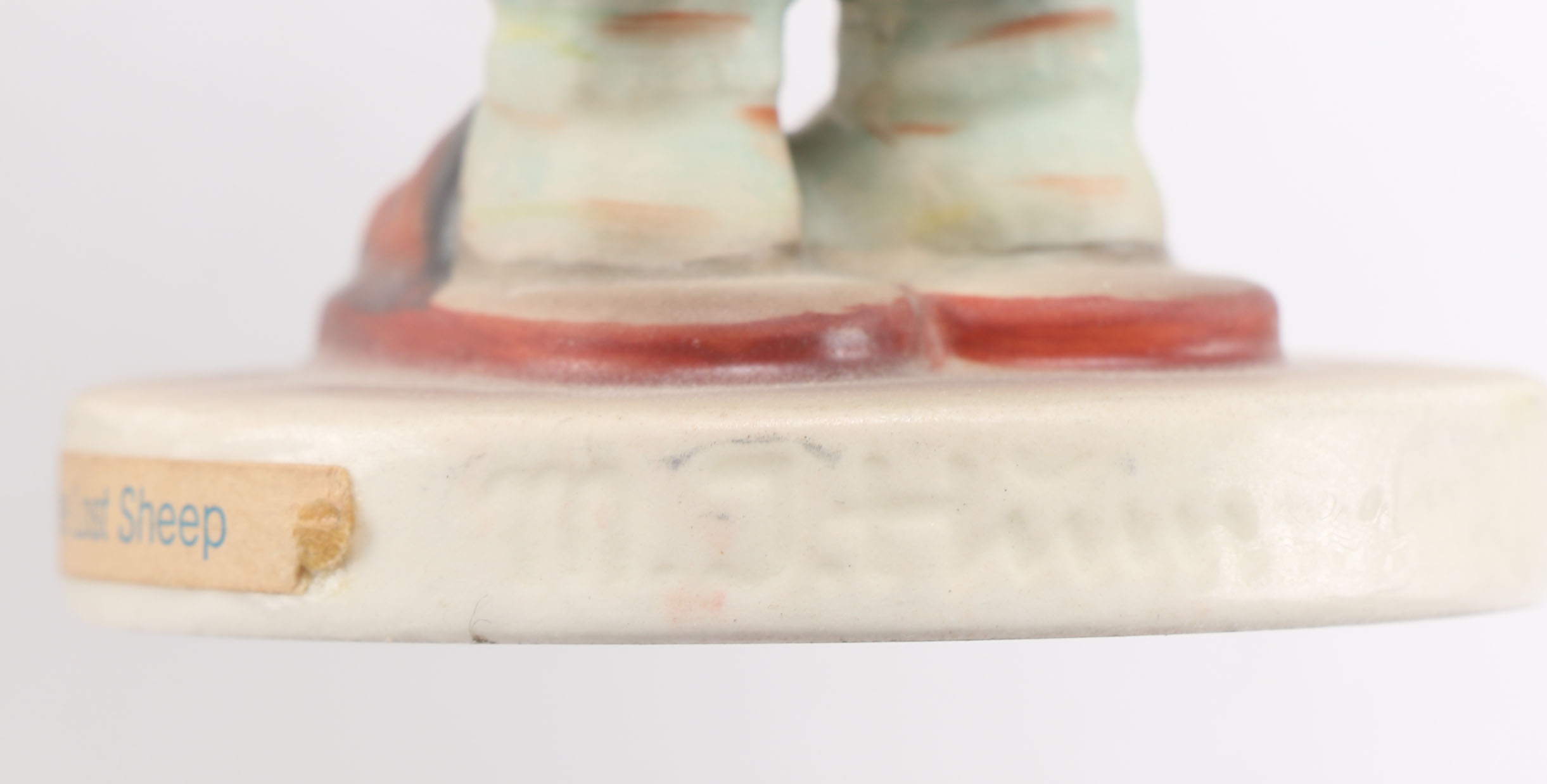 Goebel Hummels "Little Tooter", "Village Boy", "Globe Trotter", and "Lost Sheep"