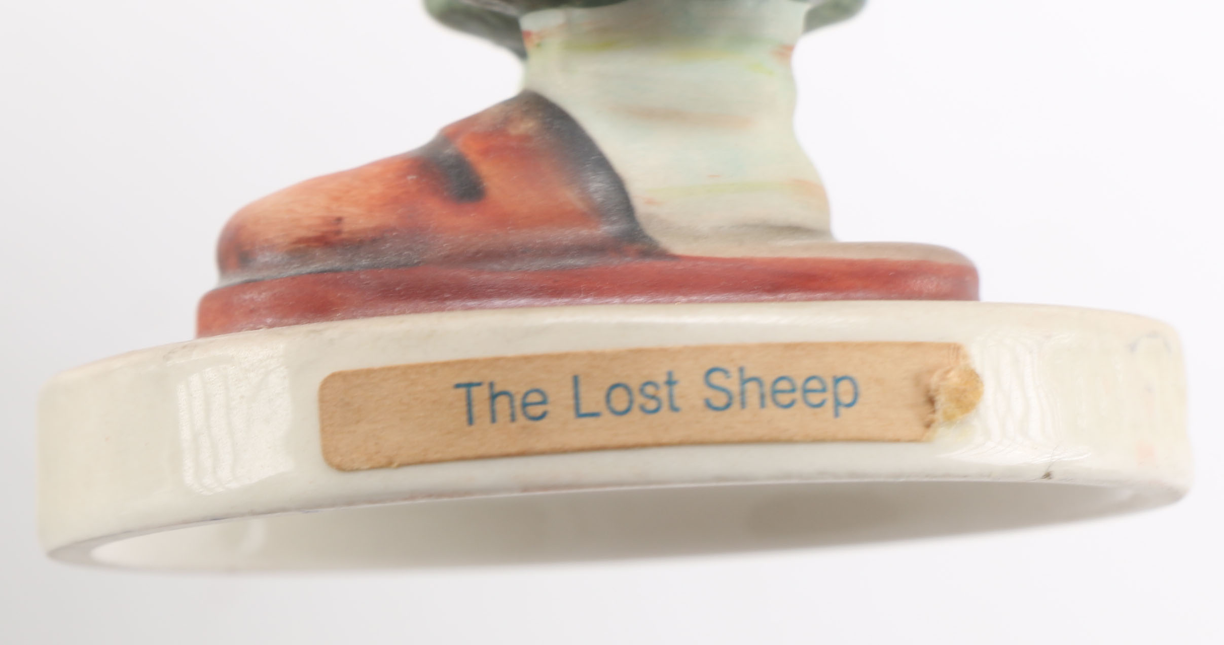 Goebel Hummels "Little Tooter", "Village Boy", "Globe Trotter", and "Lost Sheep"