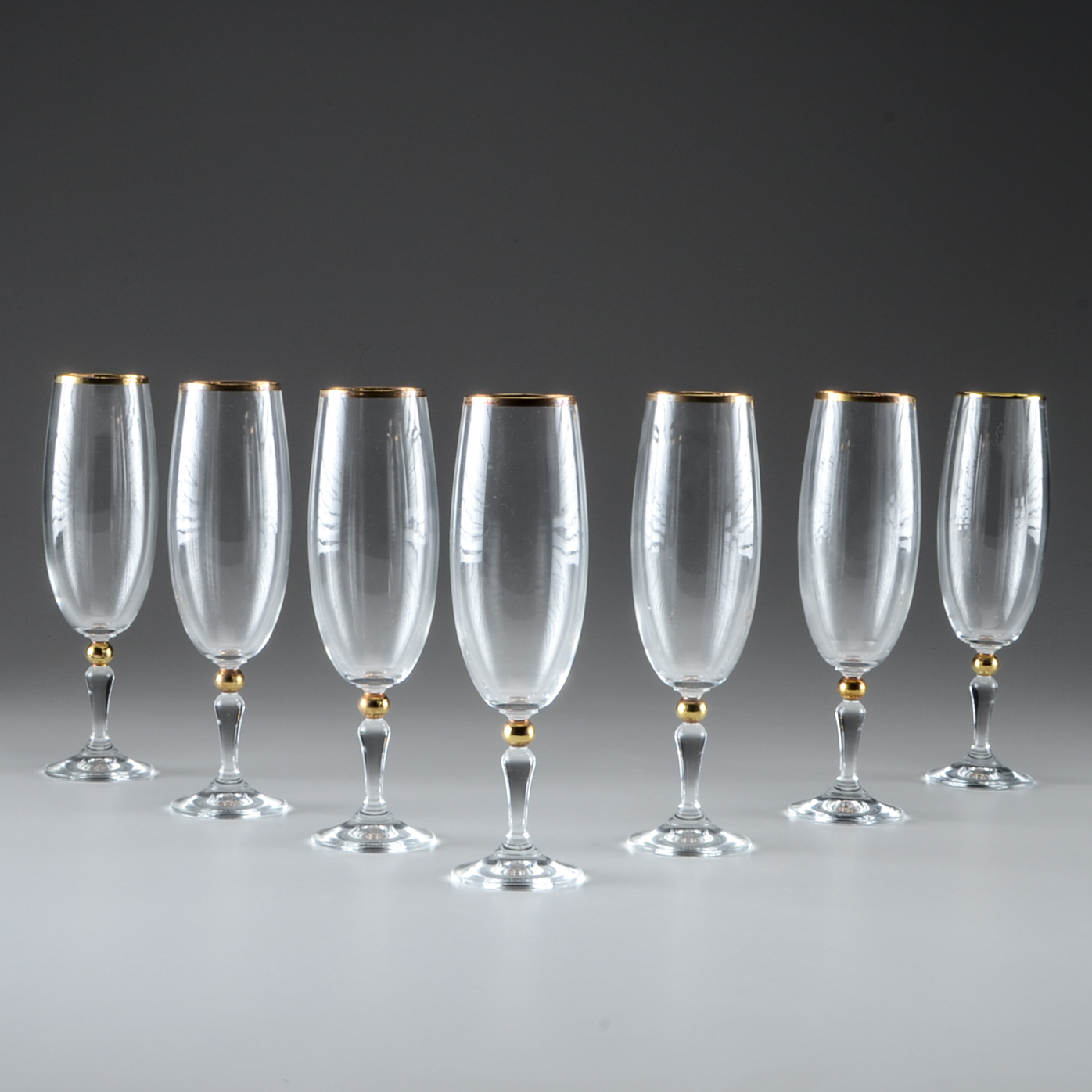 Set Of Seven Champagne Flutes