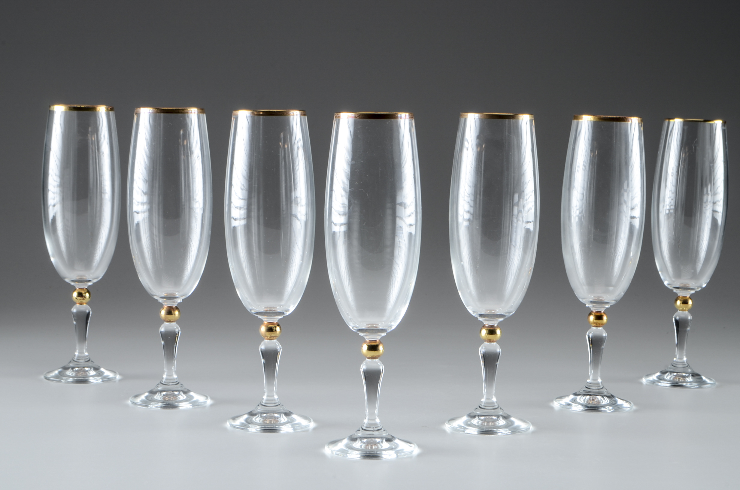 Set Of Seven Champagne Flutes
