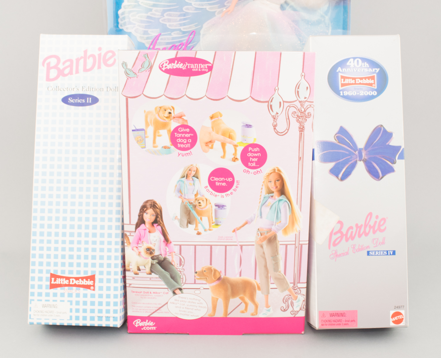 Collectible Barbie Dolls in Boxes including a 1999 Krissy Baby Layette and Little Debbie Dolls