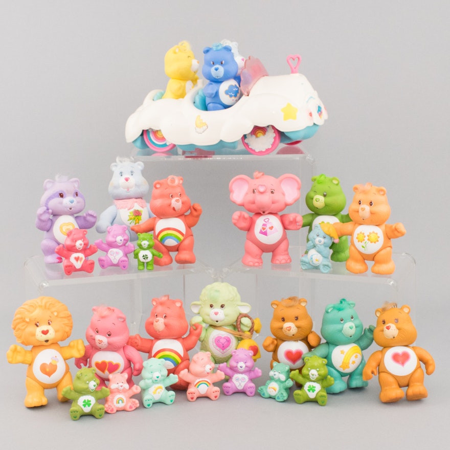 Dozens of Vintage Care Bears Posable Figurines and Cloud Car