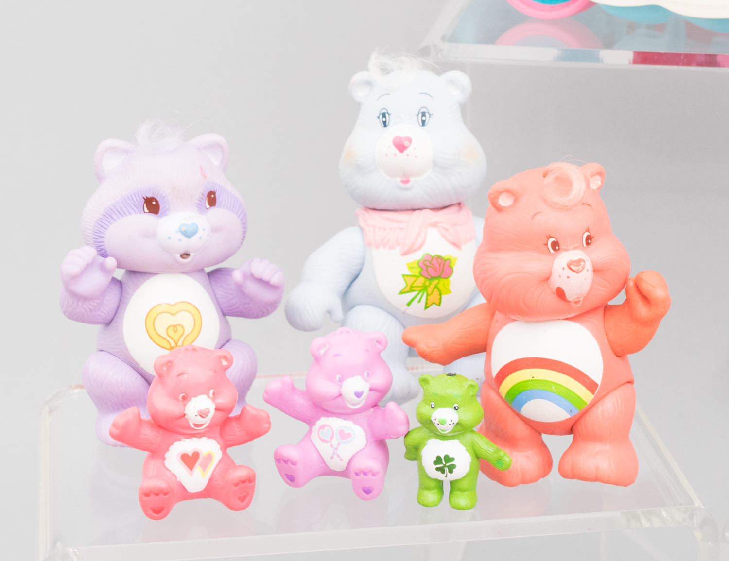 Dozens of Vintage Care Bears Posable Figurines and Cloud Car