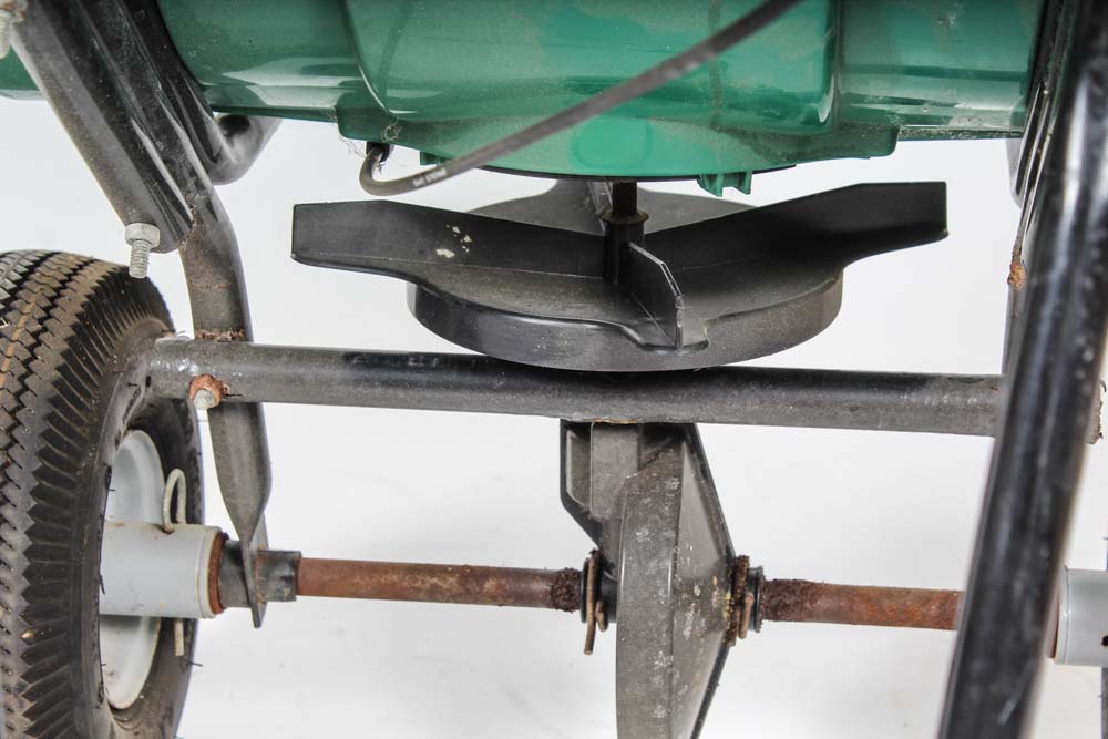 Antique Post Hole Digger and The Andersons Fertilizer Spreader