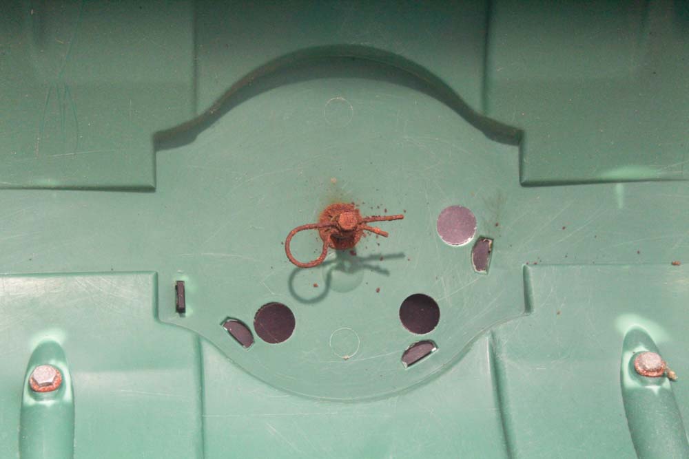 Antique Post Hole Digger and The Andersons Fertilizer Spreader