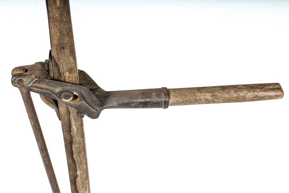 Antique Post Hole Digger and The Andersons Fertilizer Spreader