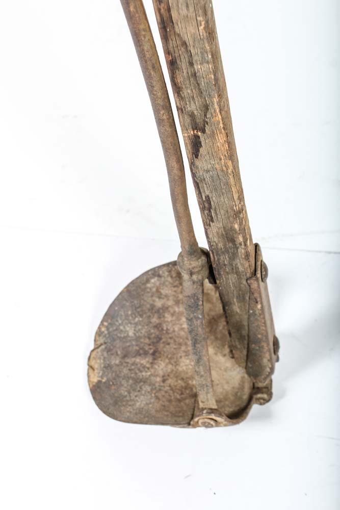 Antique Post Hole Digger and The Andersons Fertilizer Spreader