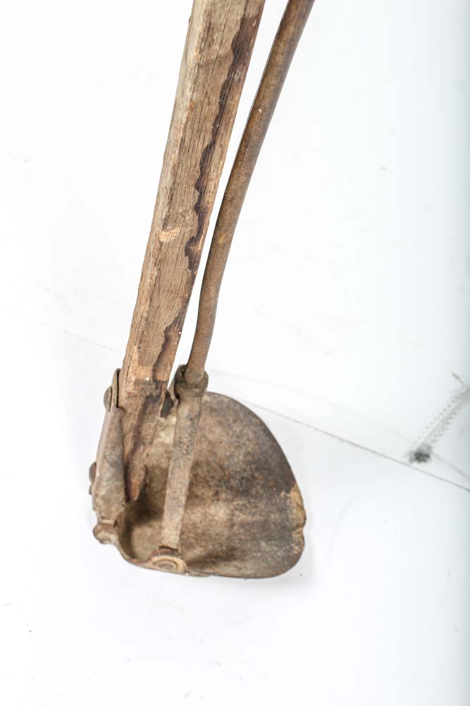 Antique Post Hole Digger and The Andersons Fertilizer Spreader