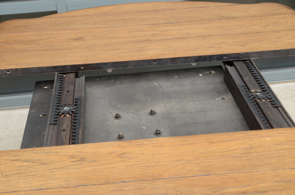 Oak Table with a Carved Pedestal Base