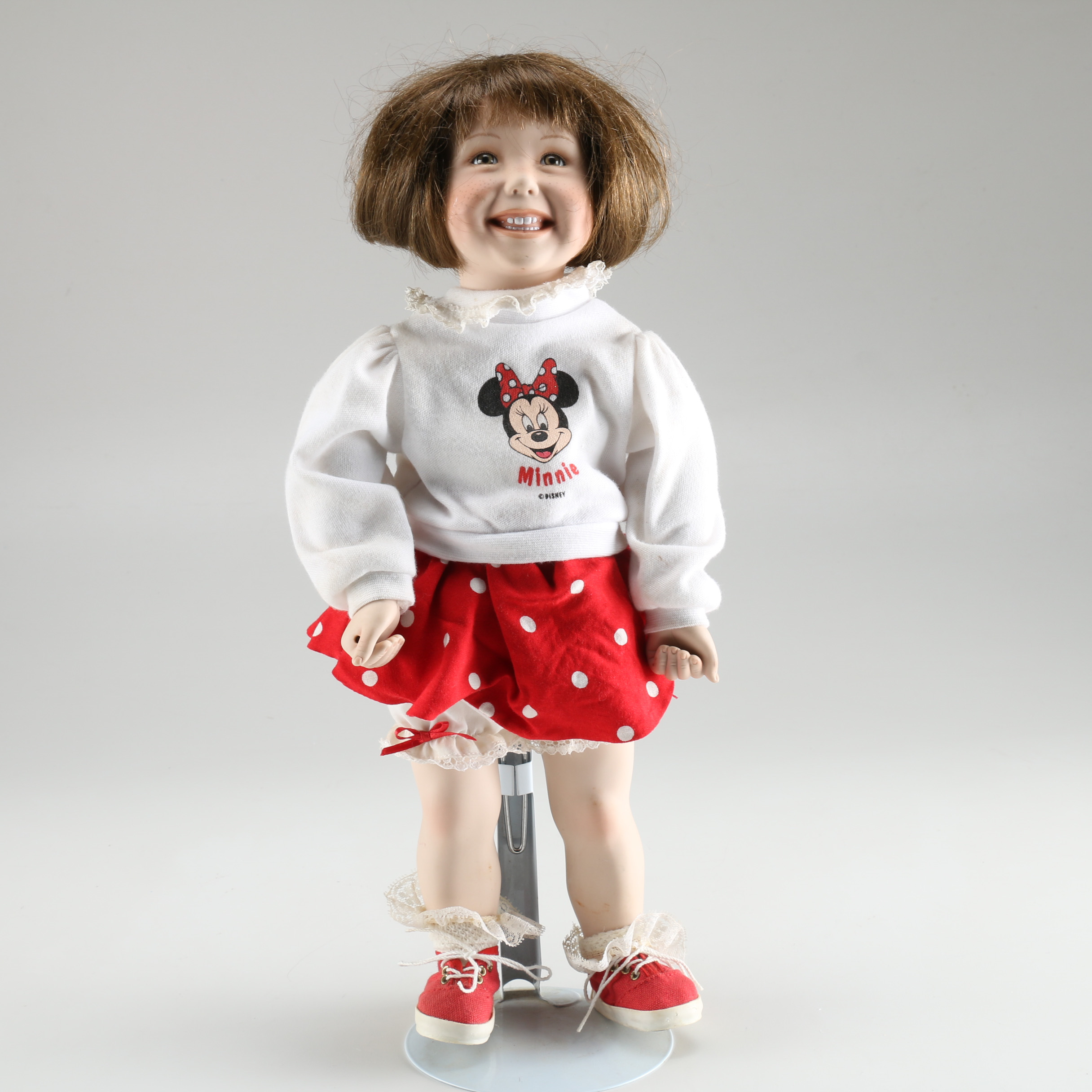Brown Haired Porcelain Doll with Minnie Mouse Clothing