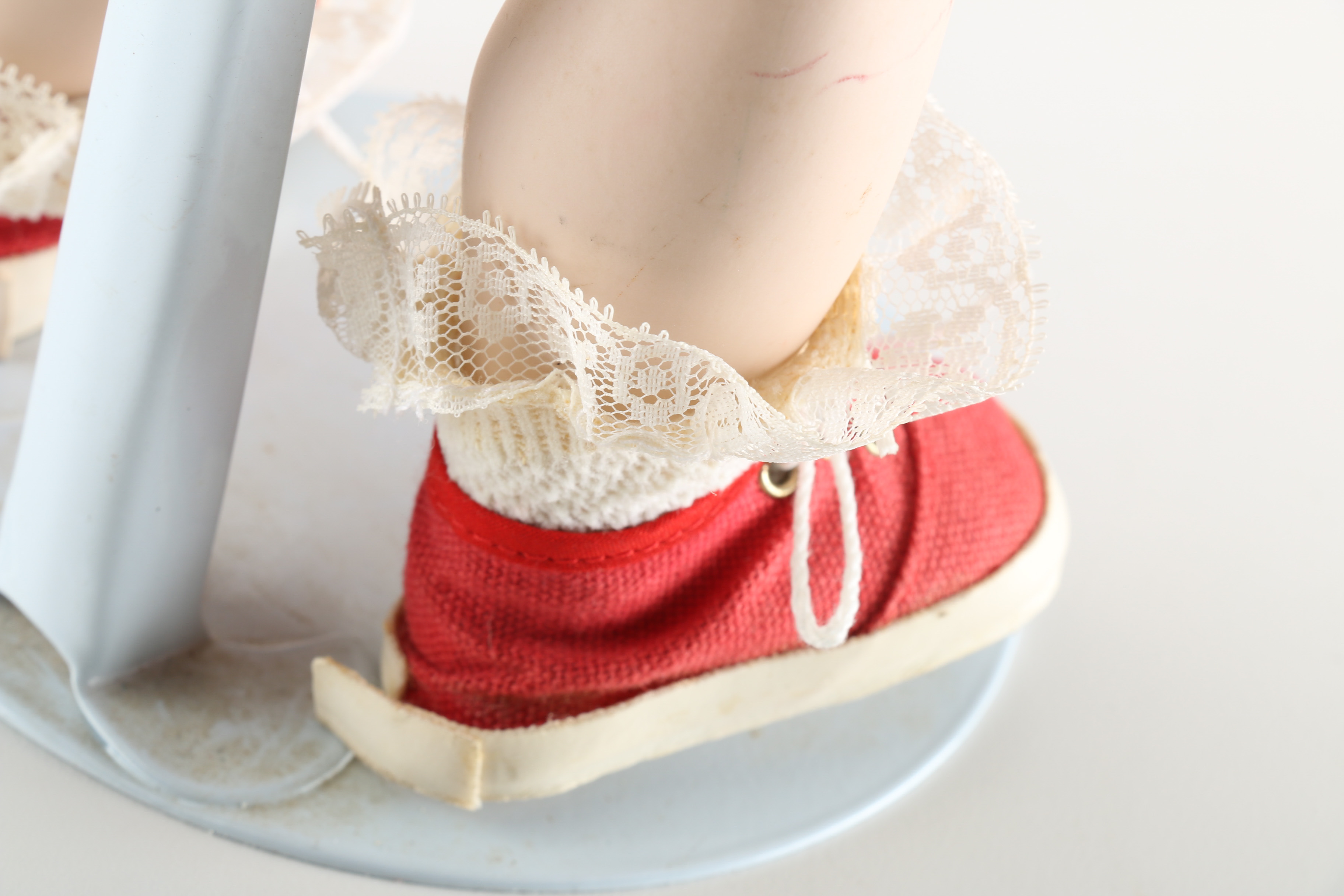 Brown Haired Porcelain Doll with Minnie Mouse Clothing