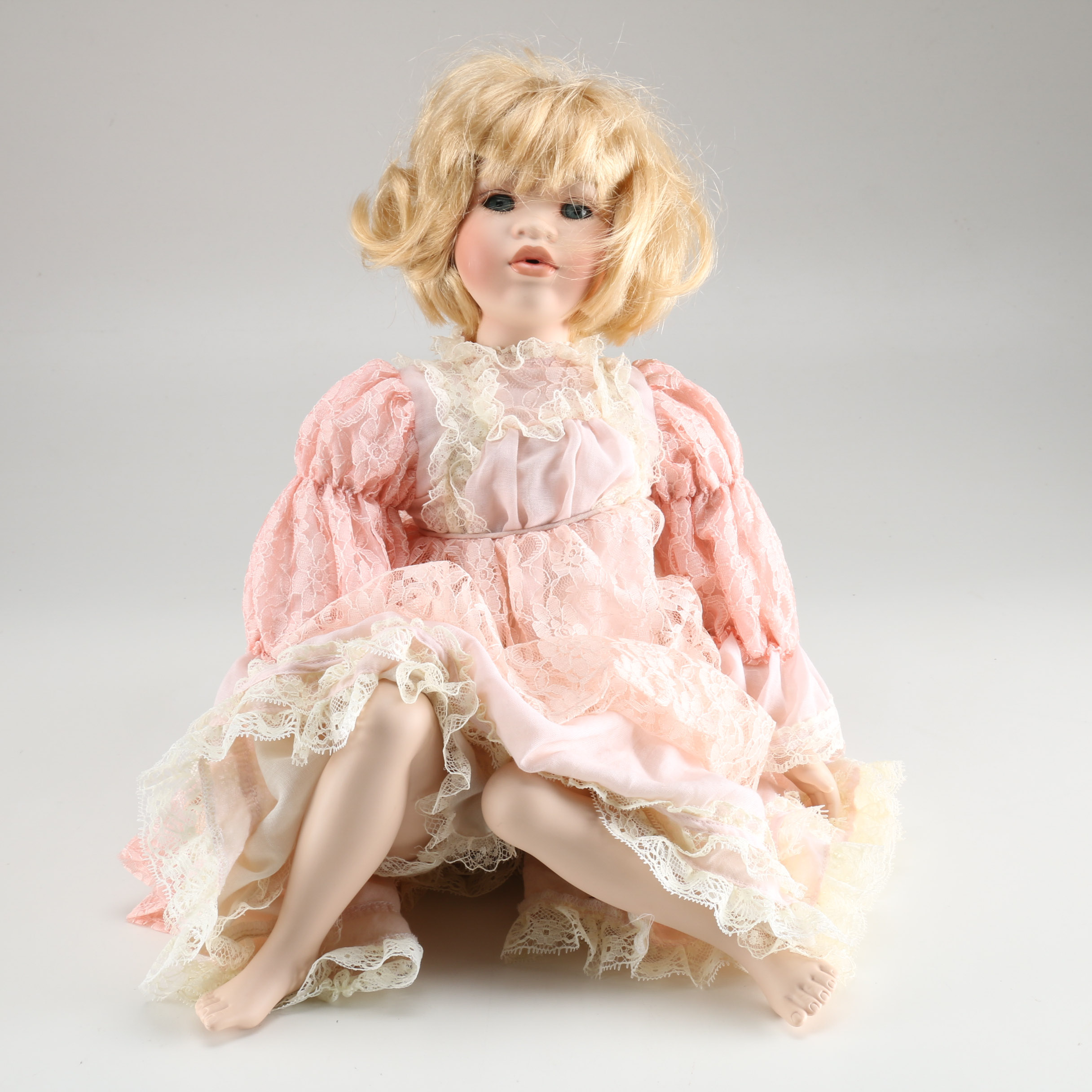 Broadway Collection Seated Porcelain Doll