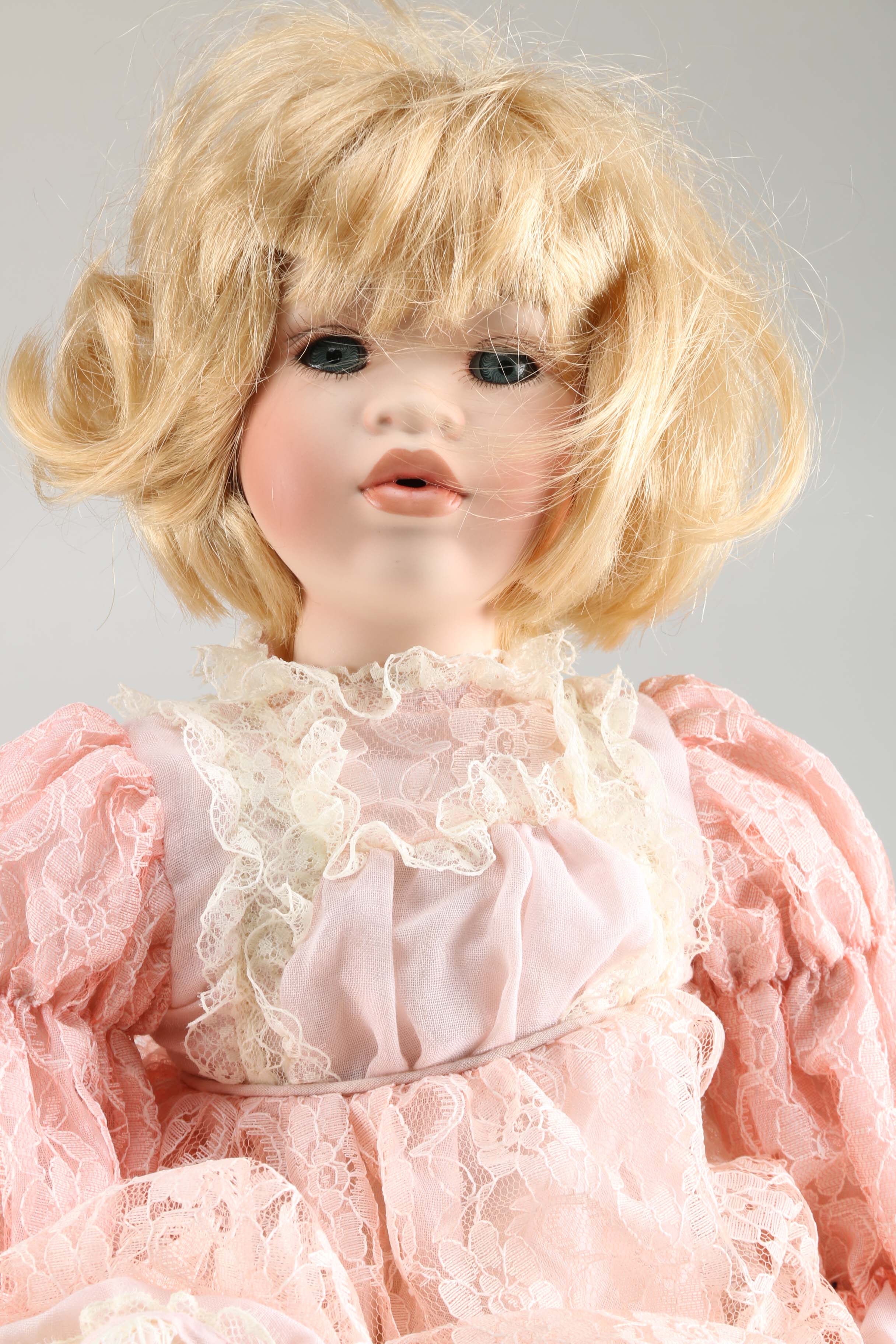 Broadway Collection Seated Porcelain Doll