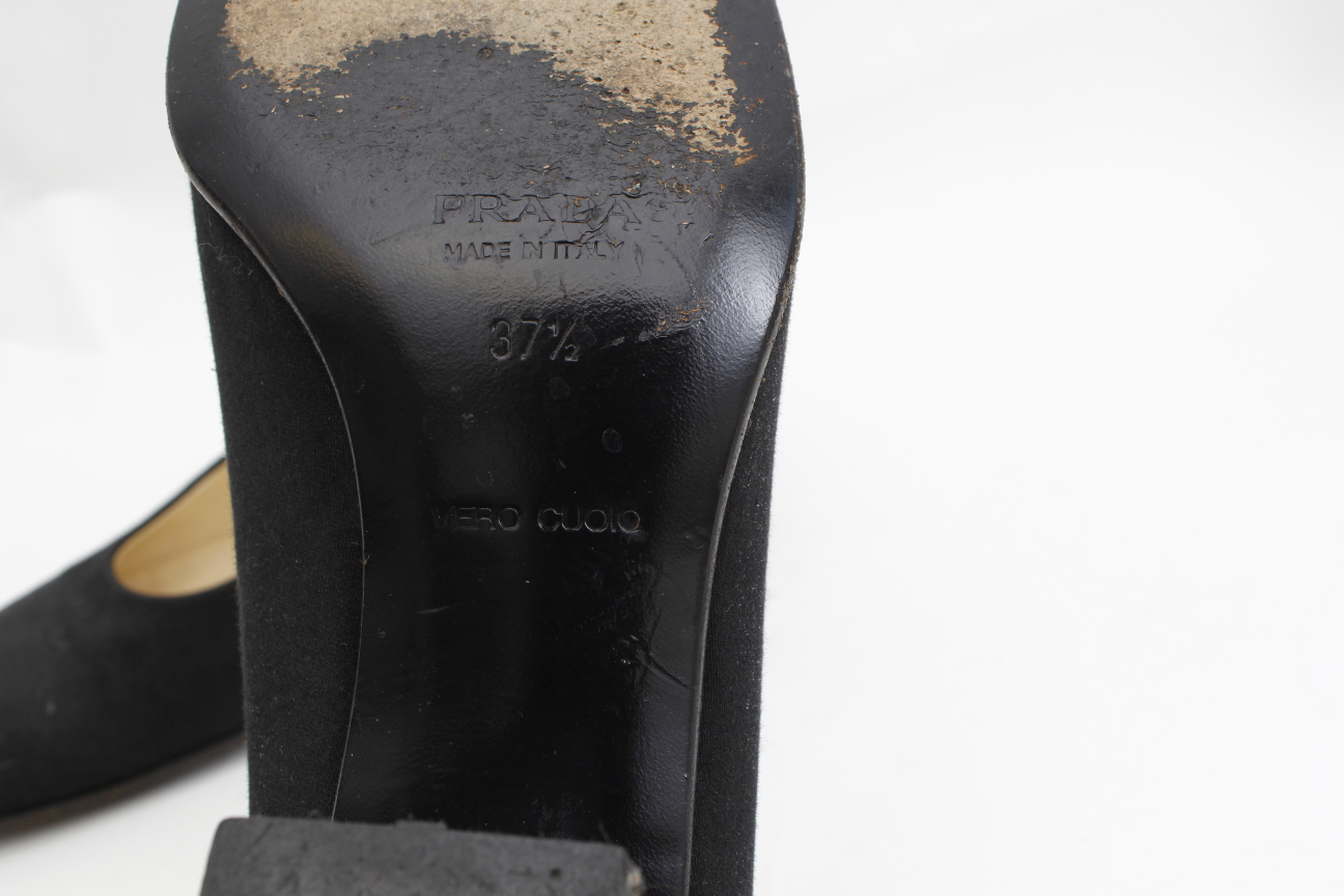 Women's Black Prada and Ferragamo Pumps
